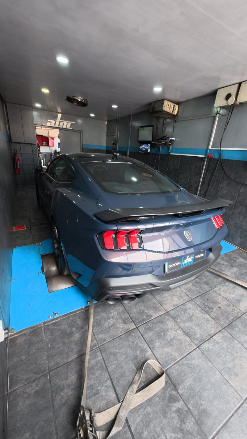 Ford Mustang positioned on the ATM in-house dynamometer
